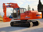 escavatore cingolato